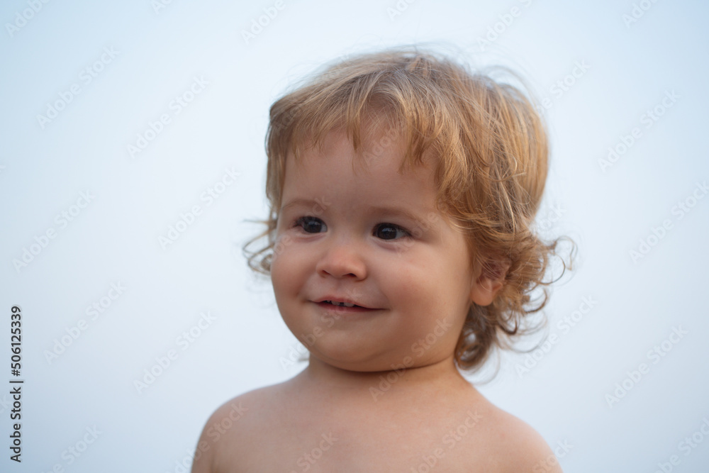 Child baby face close up. Funny little child closeup portrait. Blonde kid, emotion face. Child baby face close up. Funny little child closeup portrait. Blonde kid, emotion face.