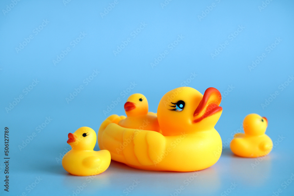 rubber duck with ducklings on a blue. rubber duck with ducklings on a blue.