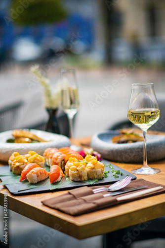 sushi and white wine outdoor