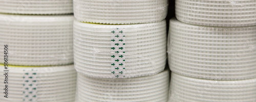 A many net stripe adhesive construction tapes for plaster sealing seams in ceiling building