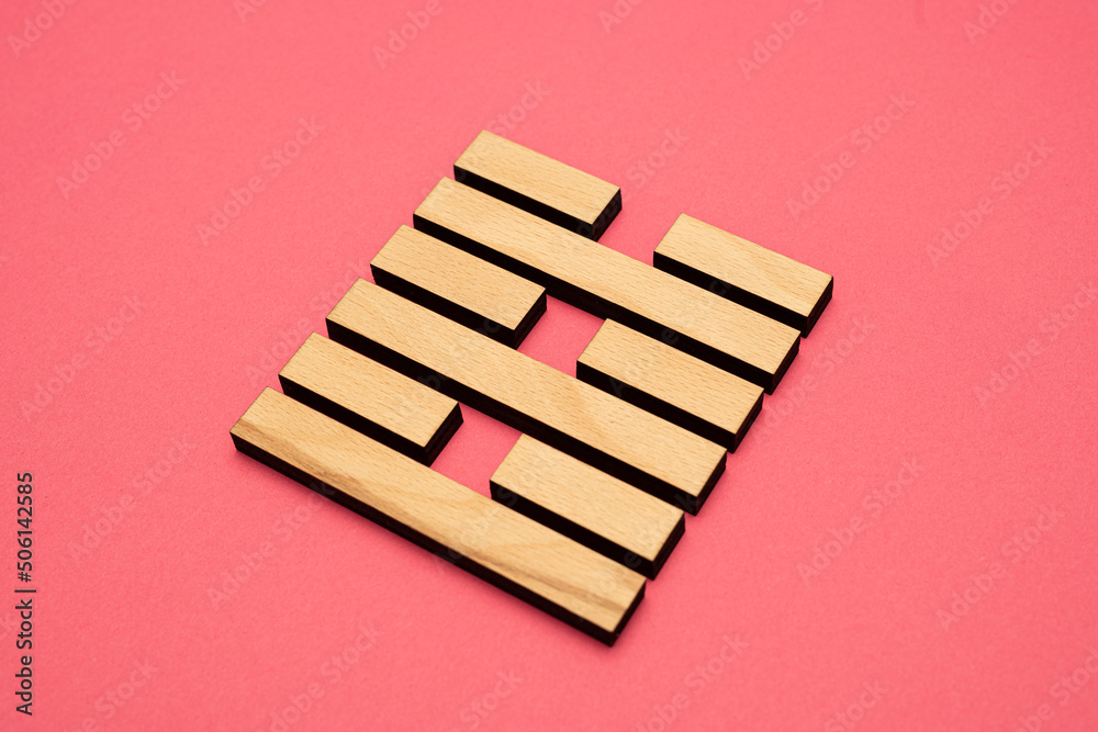 Gene Key 63 wood hexagram i ching on pink background