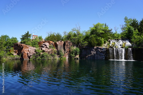 Rock formation, waterfalls, and pond at Daggett Memorial Park in Montello, Wisconsin