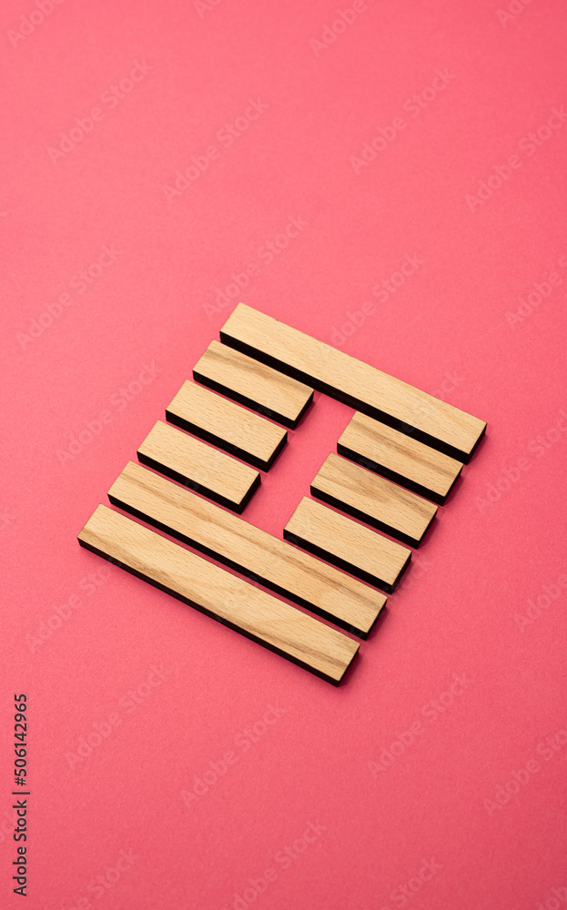 Gene Key 41 wood hexagram i ching on pink background Gene Key 41 wood hexagram i ching on pink background