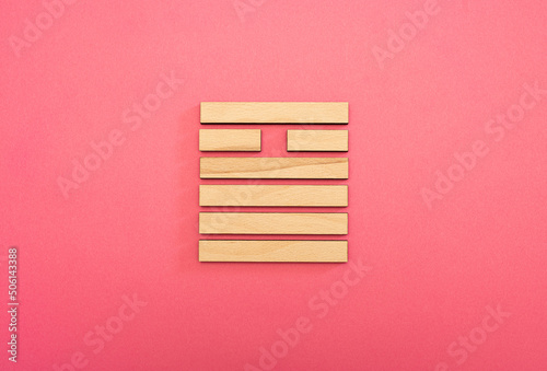 Gene Key 14 Hexagram wood i ching on pink background
