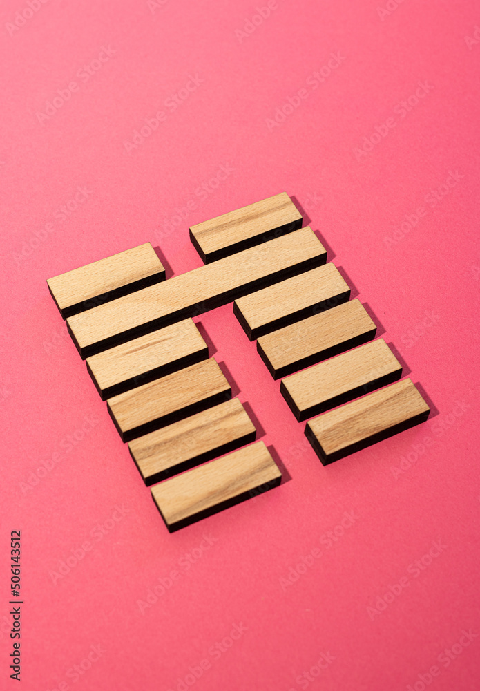 Gene Key 8 Hexagram wood i ching on pink background Gene Key 8 Hexagram wood i ching on pink background