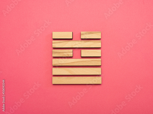 Gene Key 5 Hexagram wood i ching on pink background