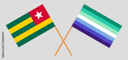 Crossed flags of Togo and gay men pride. Official colors. Correct proportion