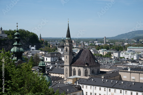 View over the old town of Salzburg  Austria  including the Franciscan Church  on a sunny day with a blue sky