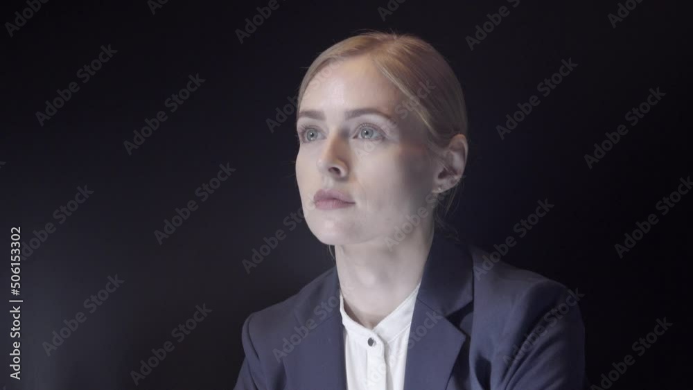 Young business woman dressed up in a suit looking confident and ready to take on the world Young business woman dressed up in a suit looking confident and ready to take on the world