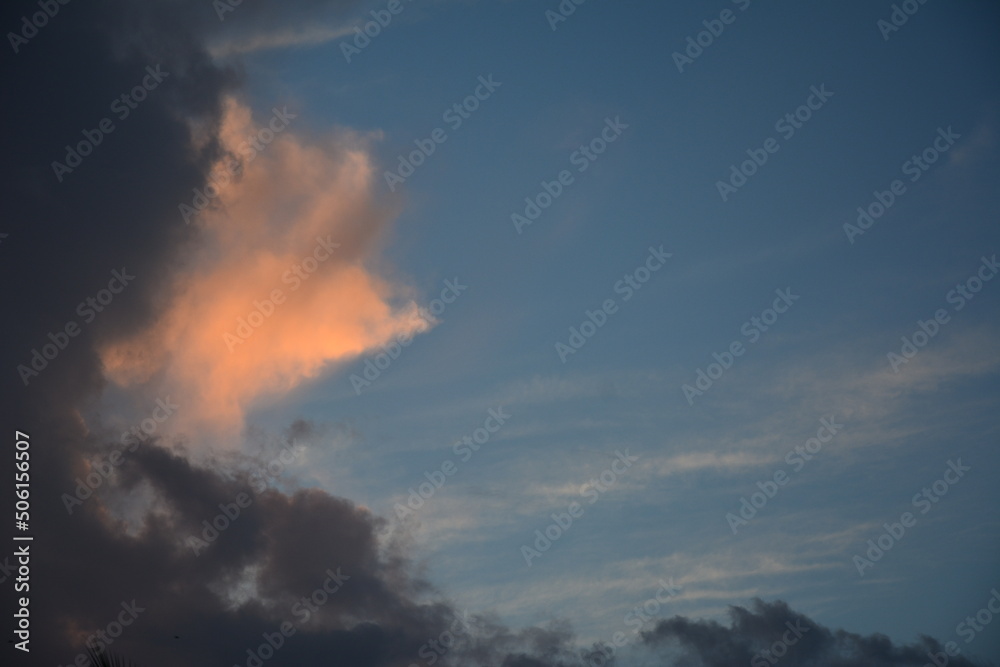 Sunrise and the clouds being lit by the appearing sun Sunrise and the clouds being lit by the appearing sun