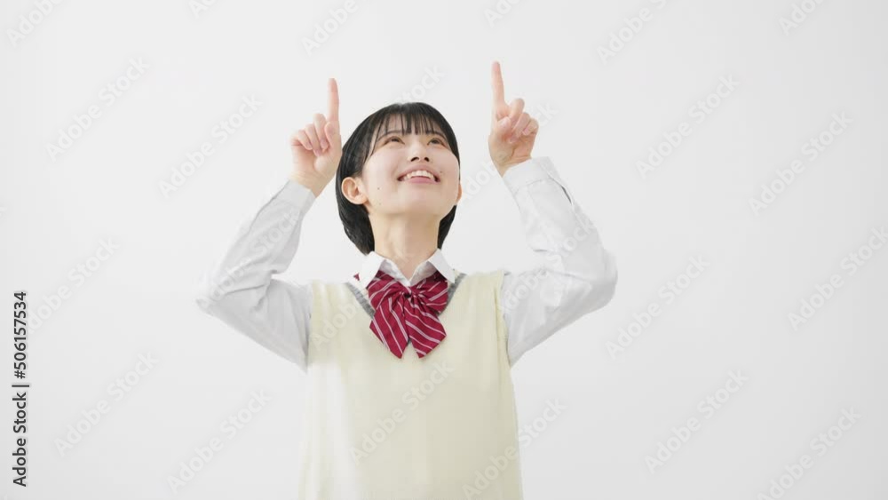 指差しをする女子高校生 指差しをする女子高校生
