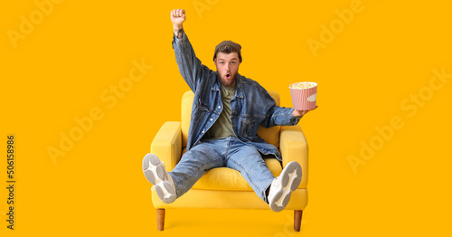 Funny young guy with bucket...