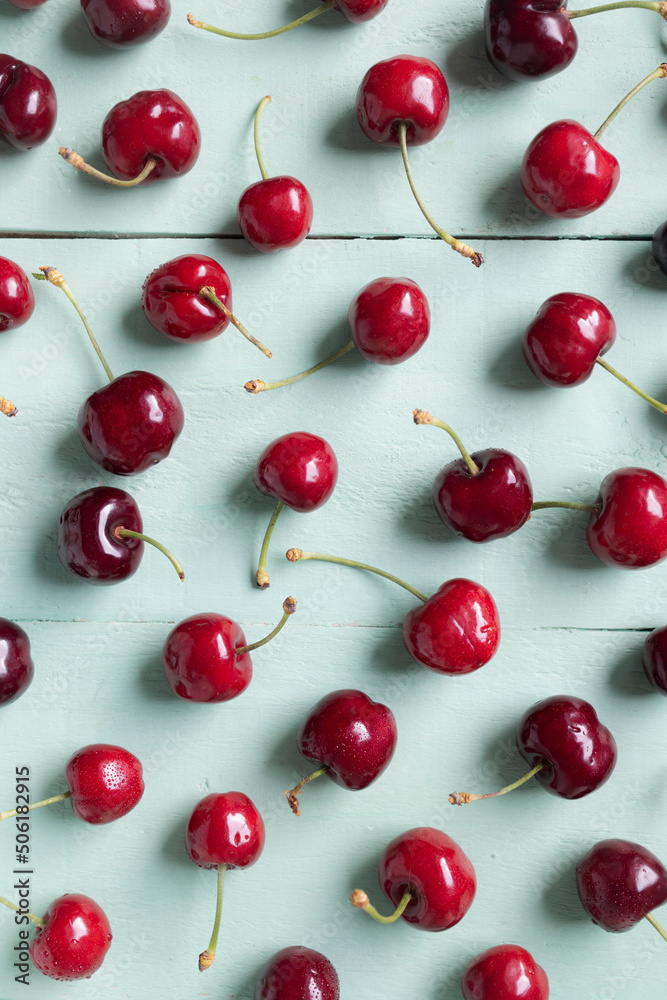 Delicious red cherries placed on the table as a pattern Delicious red cherries placed on the table as a pattern