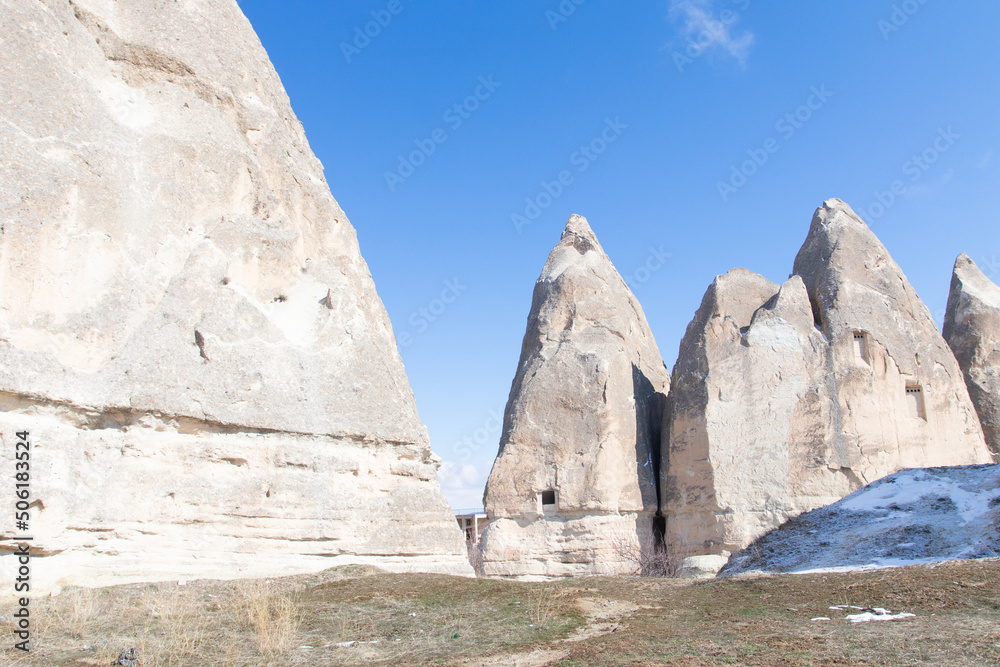 Rocks and mountains in Cappadocia with blue sky