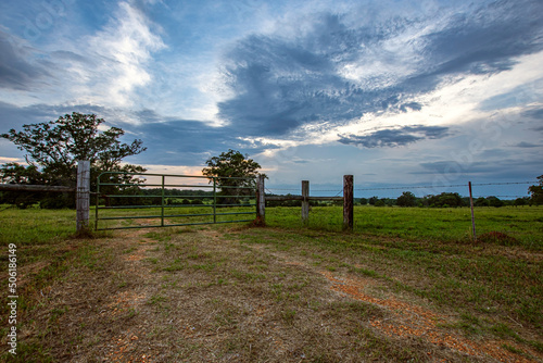Pasture gate with dramatic sky