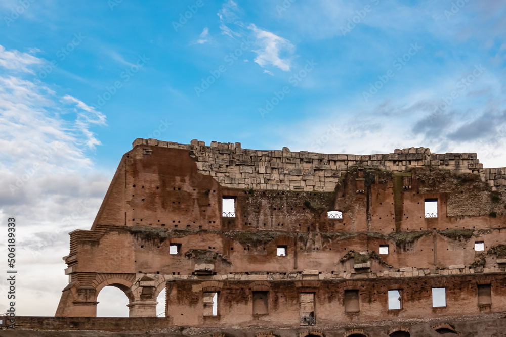 Interior view of facade of famous Colosseum of city of Rome, Lazio, Italy, Europe. UNESCO World Heritage Site. Coloseo, Flavian Amphitheater the symbol of ancient Roma city in Roman Empire