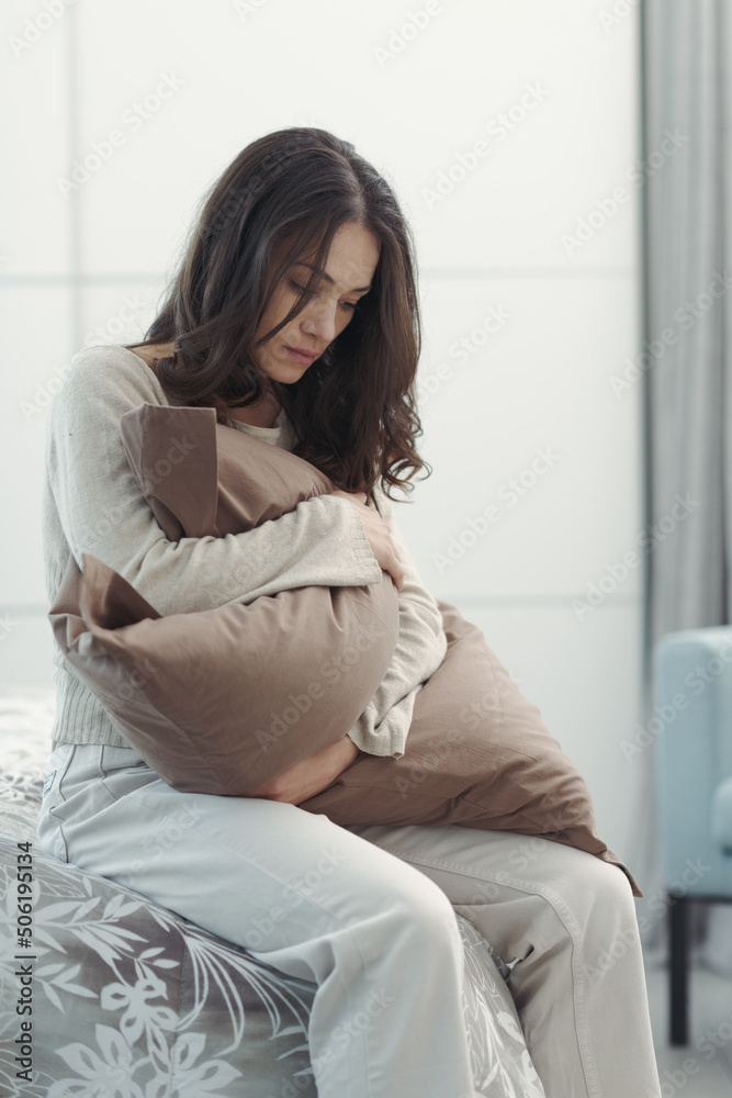 Sad young woman alone at home Sad young woman alone at home