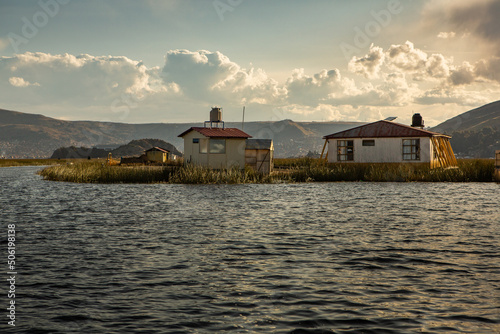 The floating village of Uros on Lake Titicaca, Peru. Lake Titicaca is the largest lake in South America and the highest navigable lake in the world. © romeof