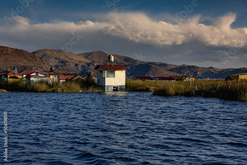 The floating village of Uros on Lake Titicaca, Peru. Lake Titicaca is the largest lake in South America and the highest navigable lake in the world.