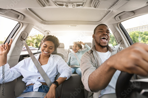 Joyful African American Family Riding New Car Singing Having Fun