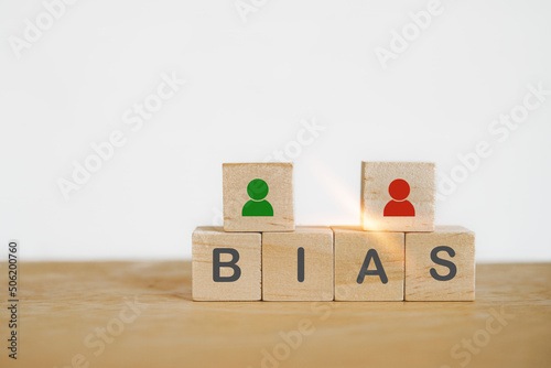 BIAS word and person icon on wooden cube blocks