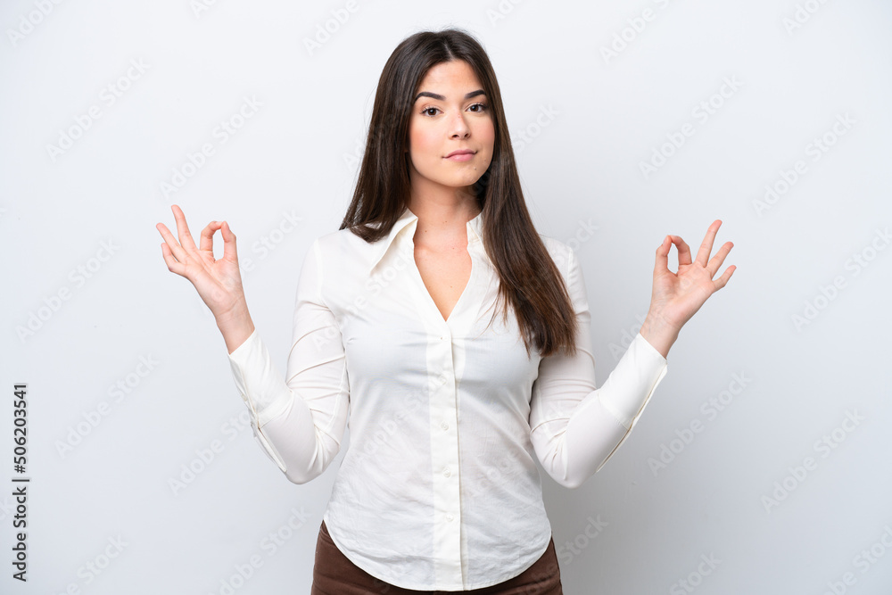 Young Brazilian woman isolated on white background in zen pose Young Brazilian woman isolated on white background in zen pose