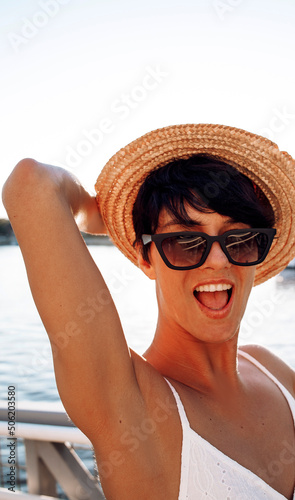 portrait of a woman in a hat. Travel concept. Summer time. Happy day. Love girl. 