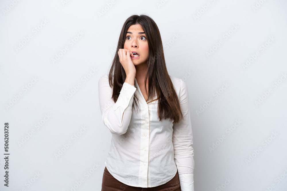 Young Brazilian woman isolated on white background is a little bit nervous Young Brazilian woman isolated on white background is a little bit nervous