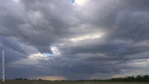 Blue sky background with white clouds in sunlight