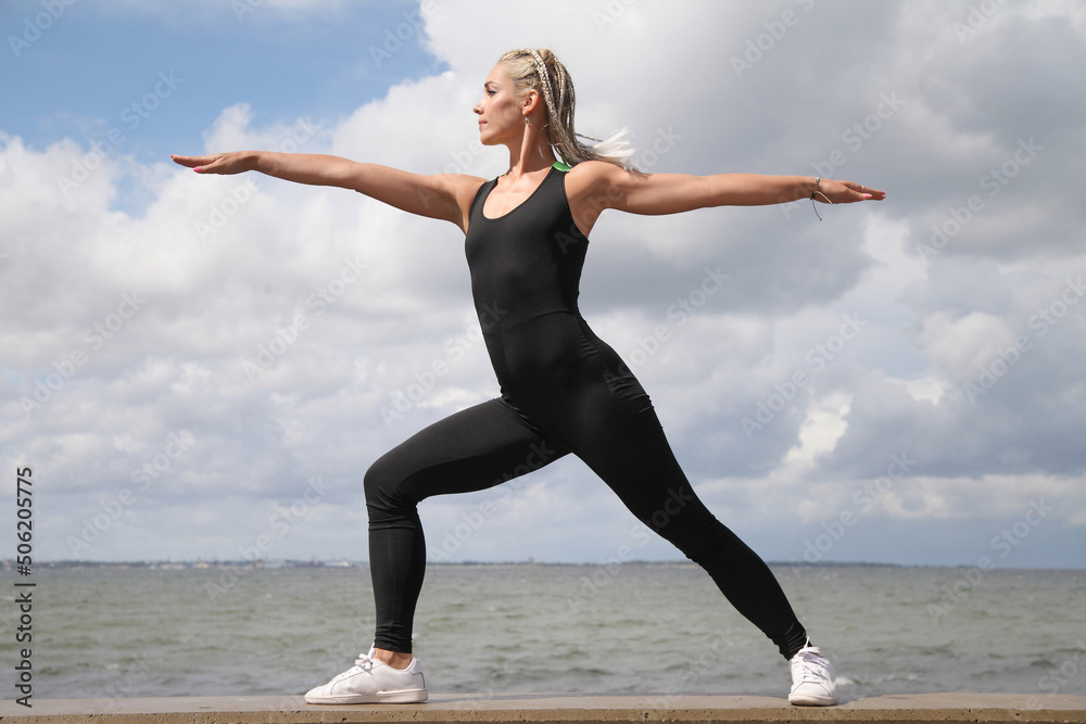 Fototapeta premium young beauty woman do exercises