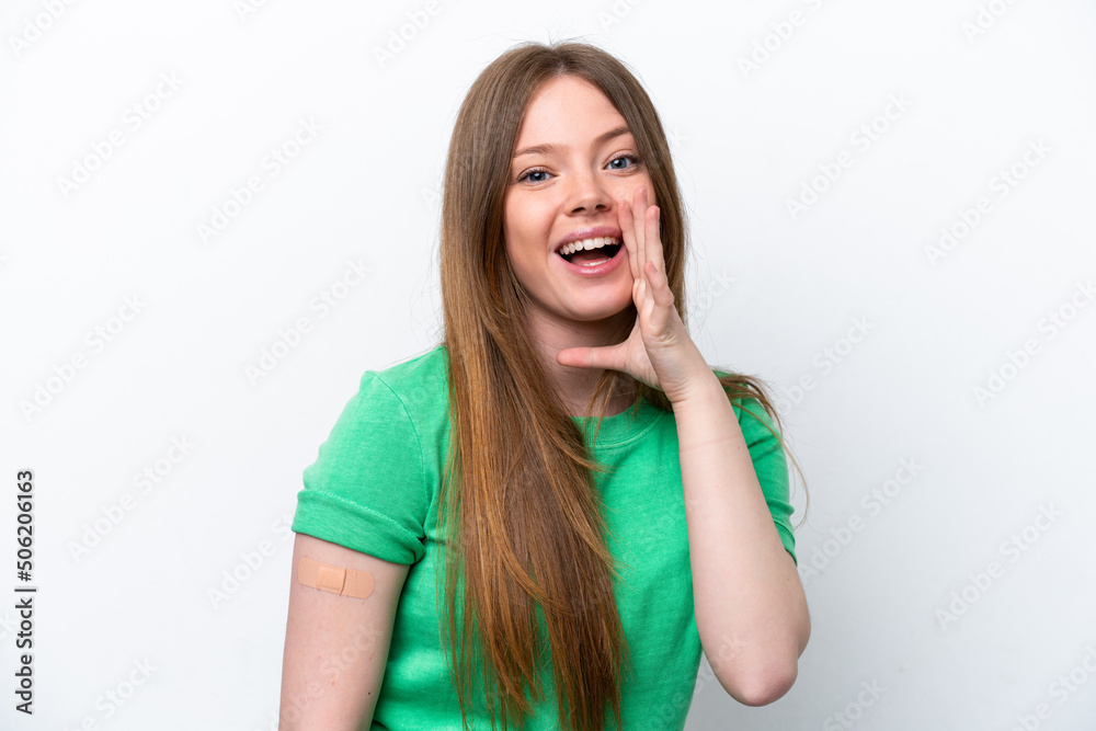 Young caucasian woman wearing a band aids isolated on white background shouting with mouth wide open Young caucasian woman wearing a band aids isolated on white background shouting with mouth wide open