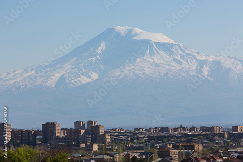 Yerevan, Armenia - April 2022: The view over the city of Yerevan and a snow peak of the mountain of Ararat in the background