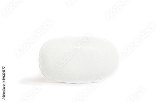 close view of pill on white background