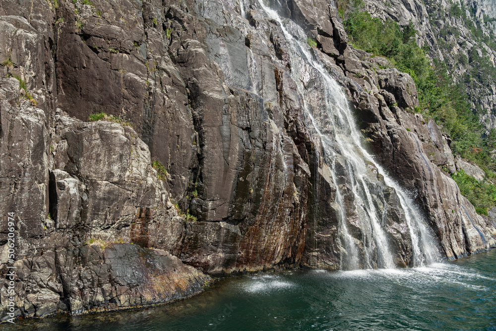 Waterfall rock mountain landscape, sea Lysefjord, Norway