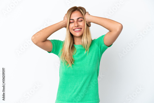 Blonde Uruguayan girl isolated on white background laughing © luismolinero