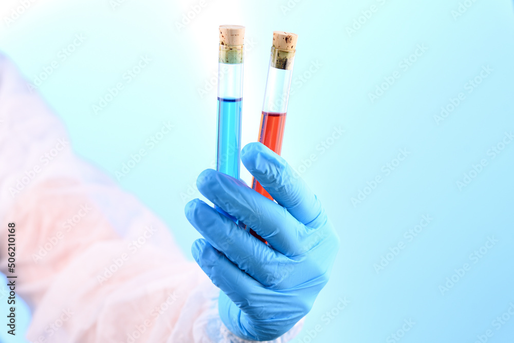 Chemical laboratory preparation in the form of blue and red liquid in a test tube. Chemical laboratory preparation in the form of blue and red liquid in a test tube.