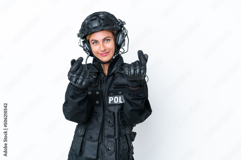 SWAT caucasian woman isolated on white background making money gesture SWAT caucasian woman isolated on white background making money gesture