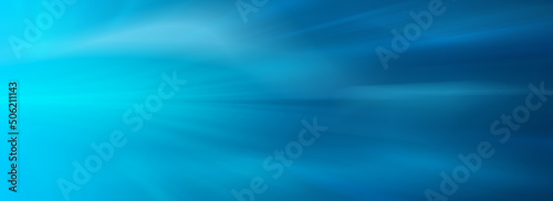 abstract blue background. Fantasy rays on blue background. Abstract vivid blue background over black. Waves and light.