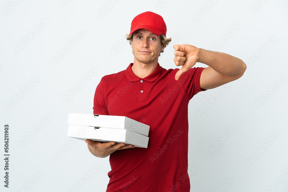 pizza delivery man over isolated white background showing thumb down with negative expression