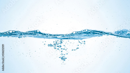 water splash on white background.Water flowing in waves and creating bubbles.