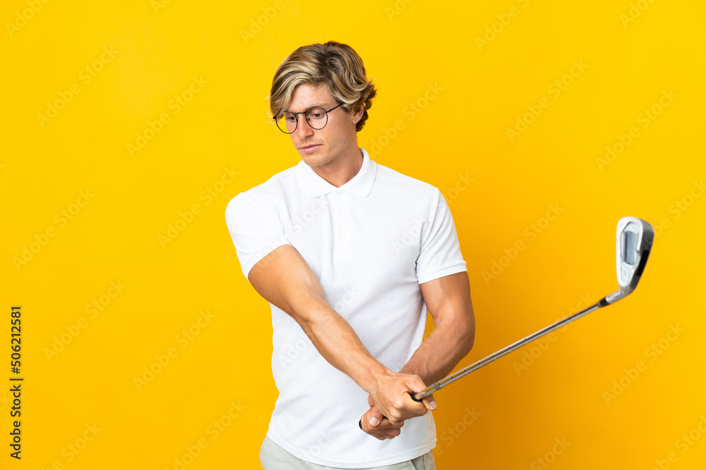 English man over isolated white background playing golf English man over isolated white background playing golf