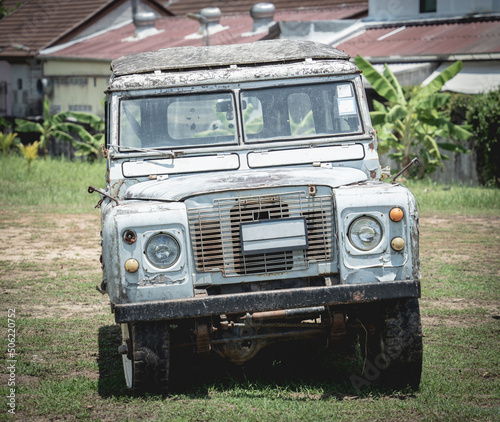 Old rusty cars for safari in the jungle of Africa