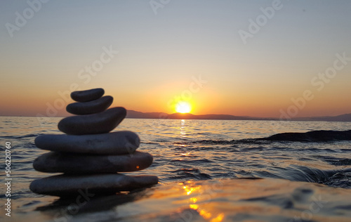 Spa stones balance on sea beach