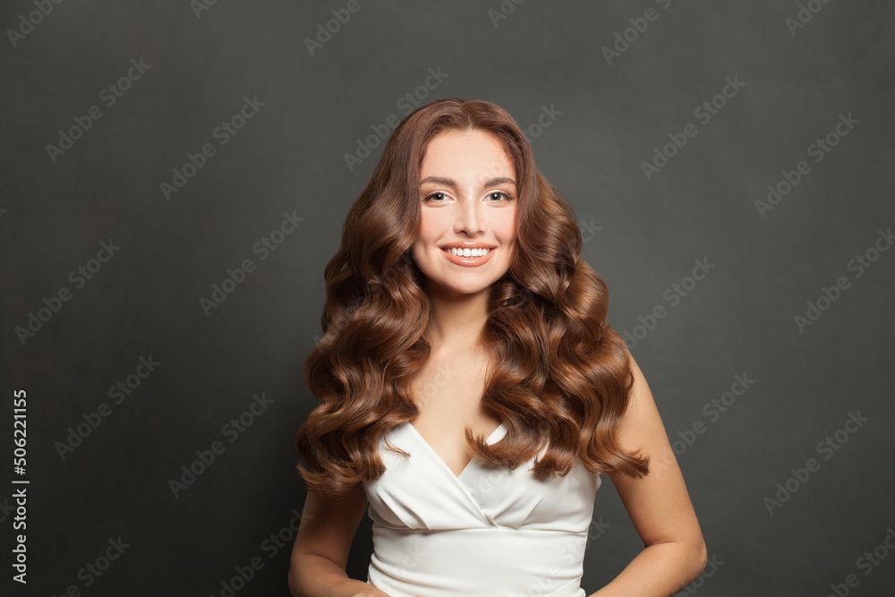 Brunette model with long and shiny wavy hair . Beautiful lady with curly hairstyle . Brunette model with long and shiny wavy hair . Beautiful lady with curly hairstyle .
