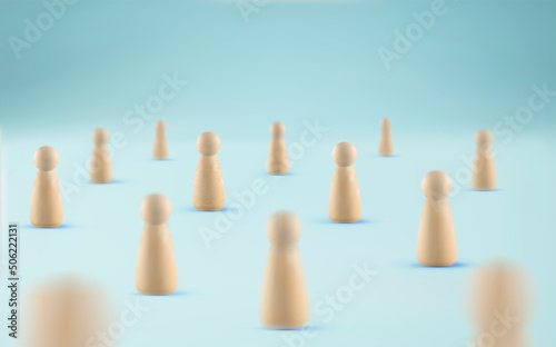 Crowd of people concept. Society concept. Many wooden figures standing on blue background.