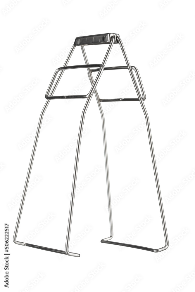 Serving kitchen tongs on white. Serving kitchen tongs on white.
