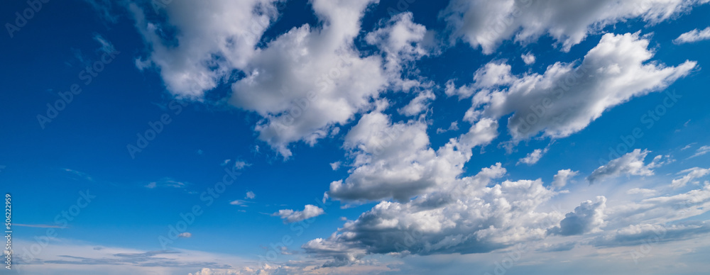 White clouds in blue summer sky panoramic  background