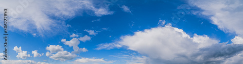White clouds in blue summer sky panoramic  background © wildman