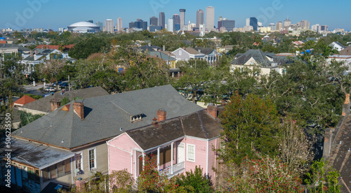 Aerial view of Garden District houses and downtown skyline in New Orleans, Louisiana, USA photo