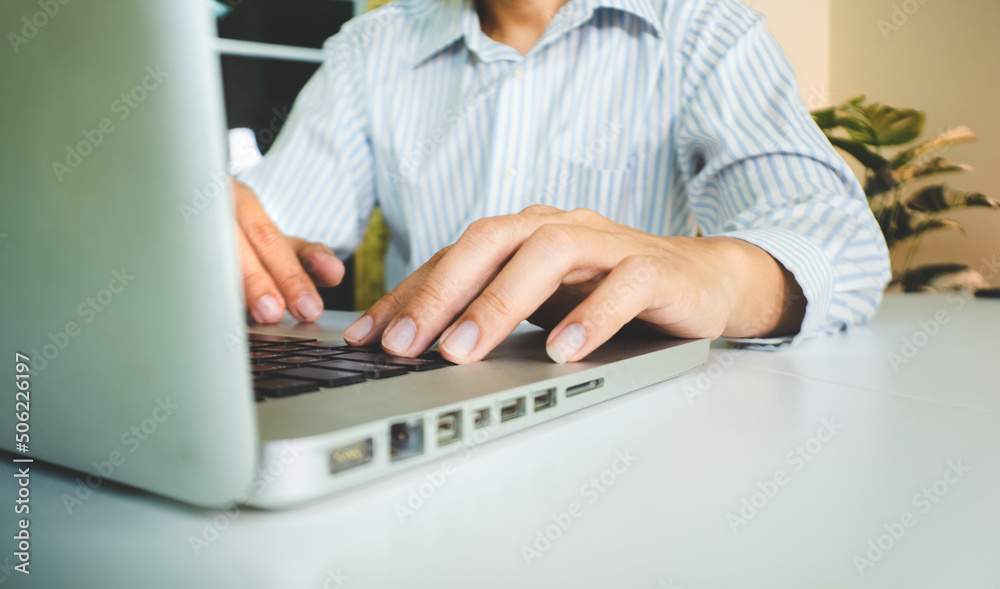 male hand typing computer using keyboard male hand typing computer using keyboard